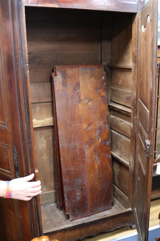 An 19th century French fruitwood armoire W.150cm